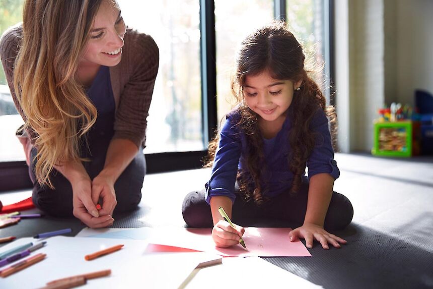 woman and child drawing