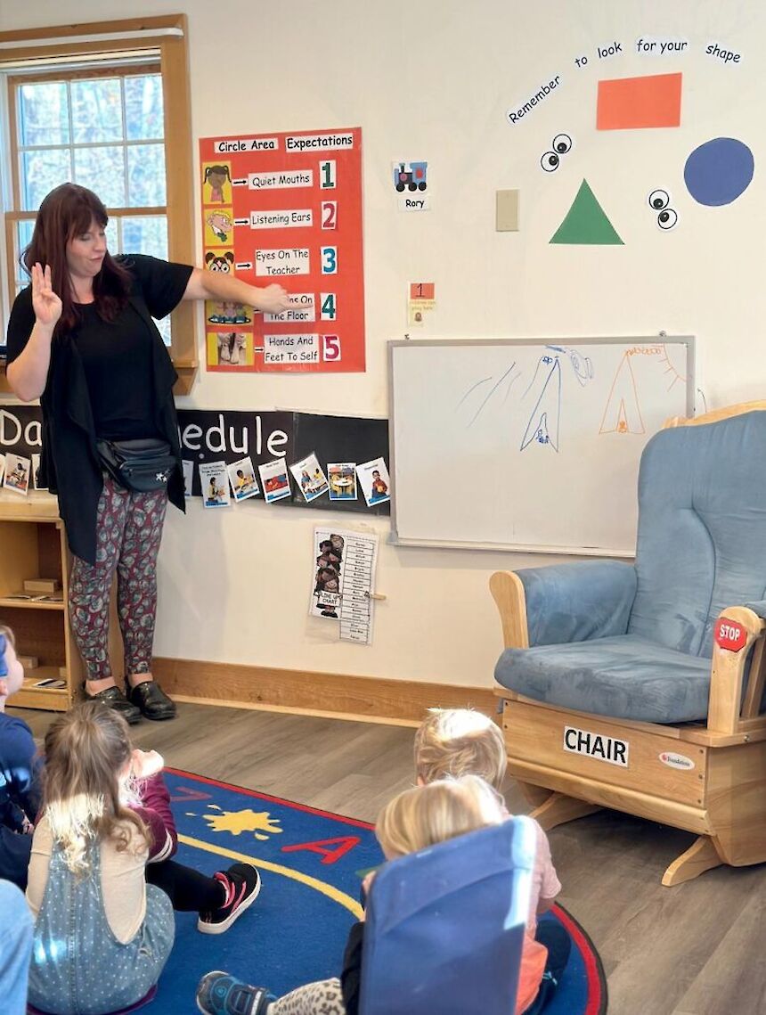 children in a small classroom setting